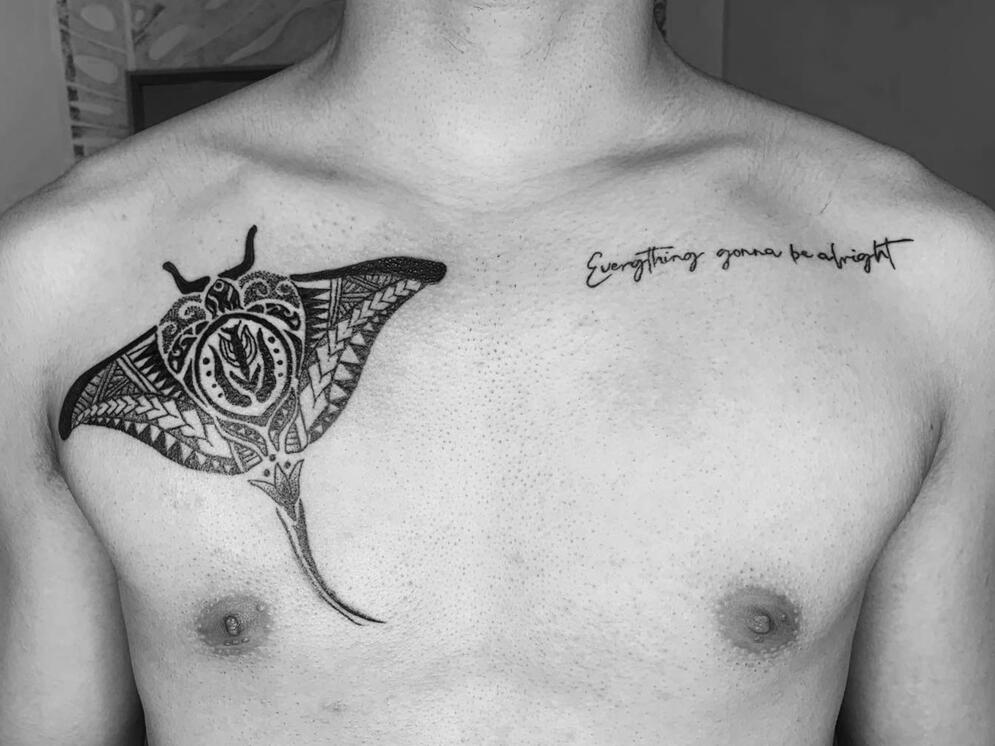 MAORI STYLE MANTA RAY AND MOTTO TATTOO