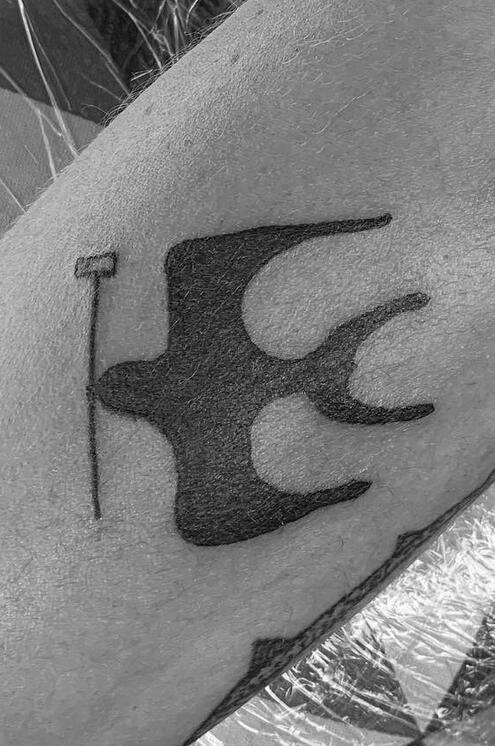 SWALLOW WITH POLO MALLET FOREARM TATTOO