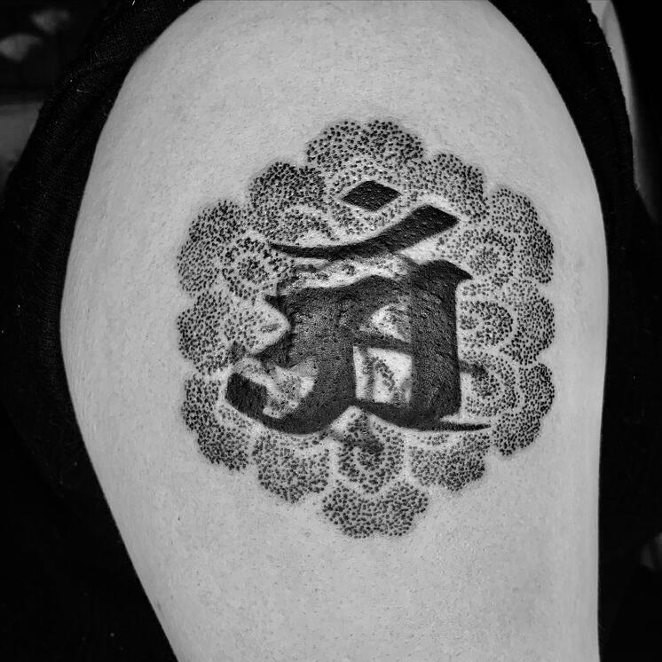 DOT MANDALA WITH SANSKRIT CHARACTERS COVER UP TATTOO ON UPPER ARM