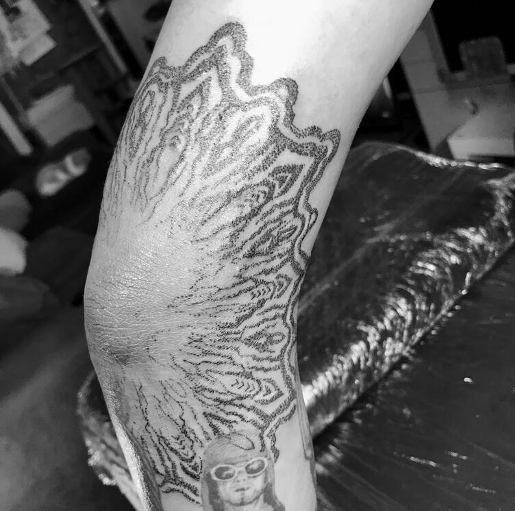 HEPTAGONAL GEOMETRIC ELBOW TATTOO