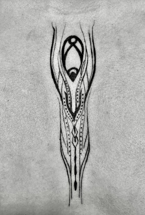 ORNAMENT STYLE STERNUM TATTOO