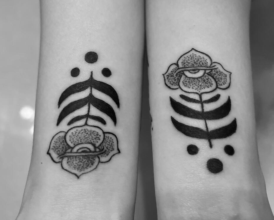EYEBALL FLOWER WRIST TATTOO